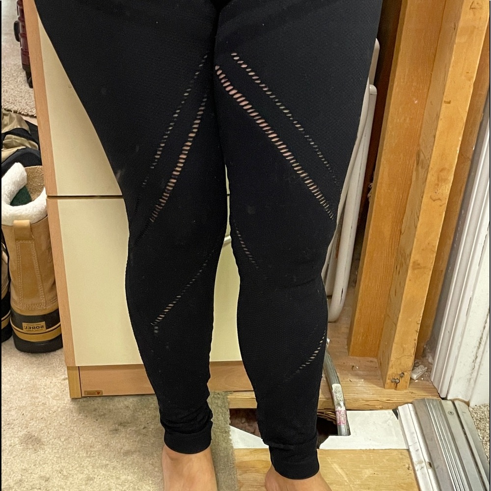 Black “fishnet” style leggings size small